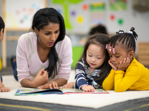 Image of a teacher with Pre-K students