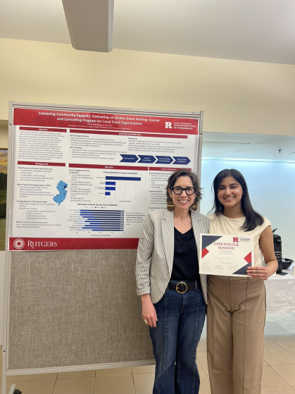 Rutgers student researcher Tirzah Johns (left) with project principal investigator Dr. Cara Cuite. Johns received an award for her research presentation on participation in the project's online grant-writing course at the Rutgers Human Ecology Research Symposium.